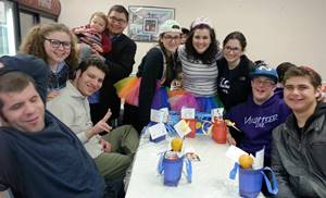Members of Baltimore Yachad at their Purim party.