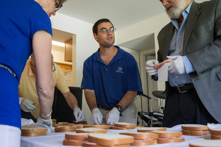 Jordan Levy, 24, helped make sandwiches last month while preparing for his bar mitzvah along with other students in Hauppauge, N.Y. Drumming helped him memorize lines of the Torah, he said.